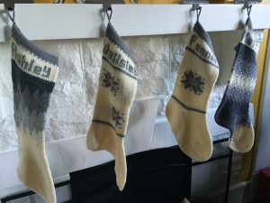 Ashley stockings - all four by the fireplace